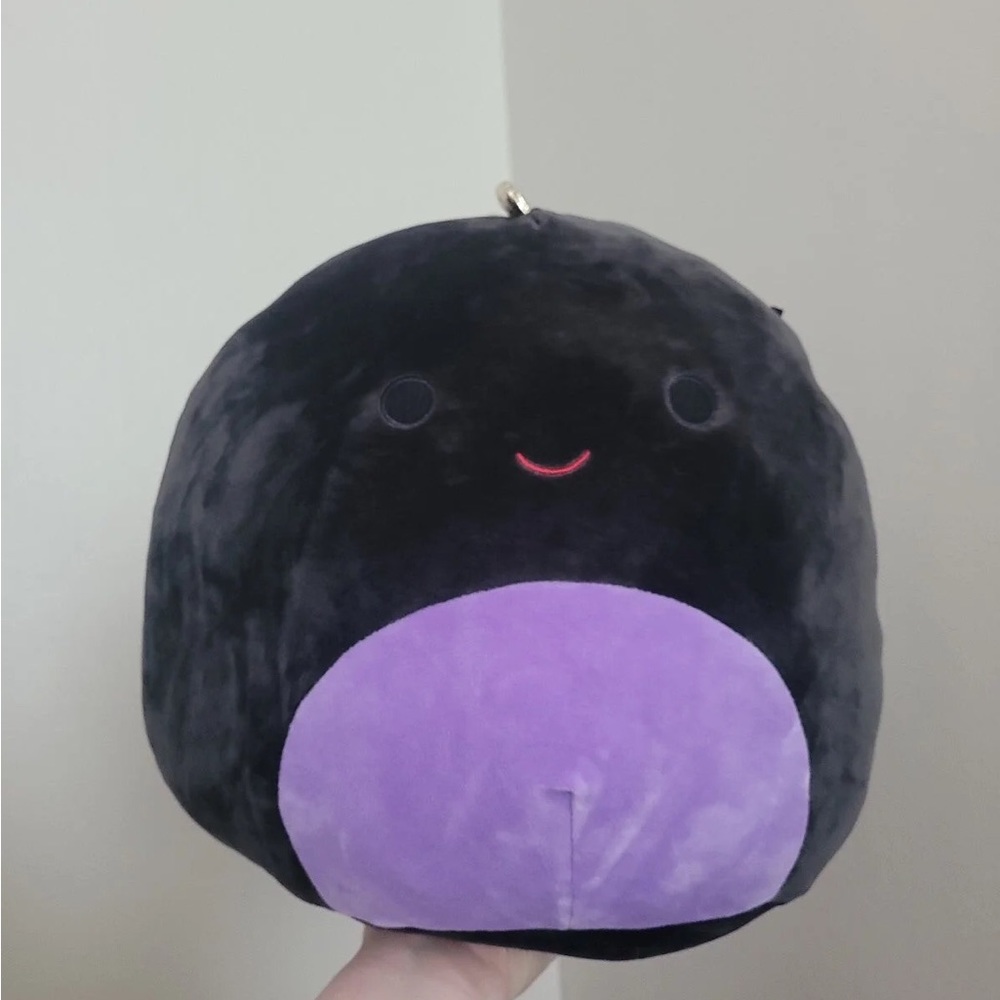 Camille the dinosaur squishmallow
